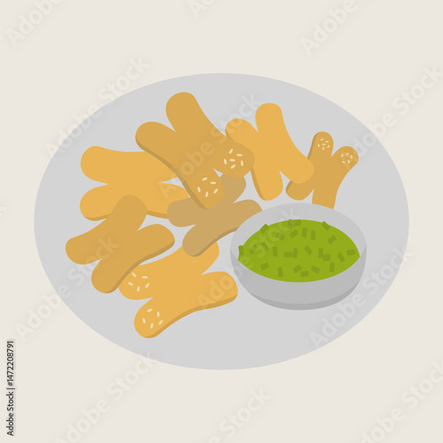 Crispy fried dough, golden brown, served on white plate with bowl of green dipping sauce, creating delicious and inviting snack scene
