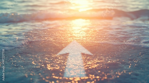 Upward Arrow in Sparkling Ocean Water at Sunset