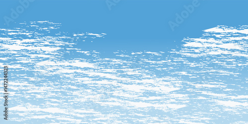 clear blue sky with a few clouds. The sky is very bright and the clouds are scattered throughout