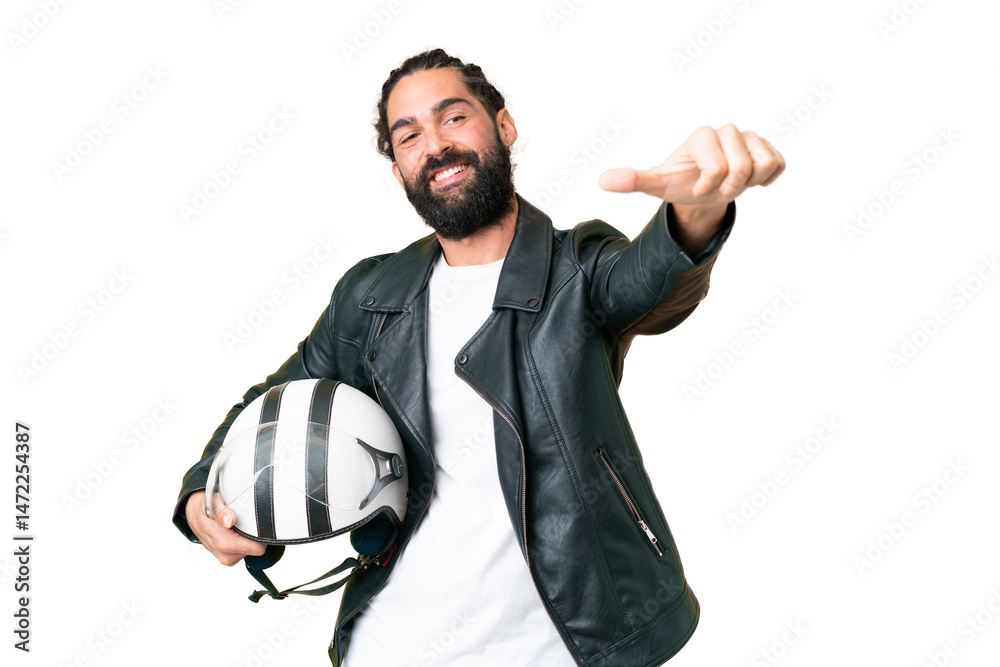Naklejka premium Young man with beard with a motorcycle helmet over isolated chroma key background giving a thumbs up gesture