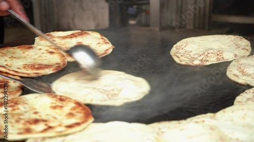 fresh and hot roti bread on Mumbai street stall, India