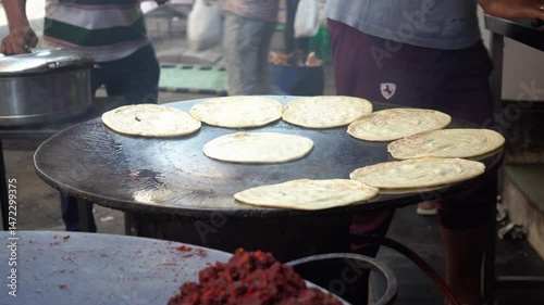 fresh and hot roti bread on Mumbai street stall, India