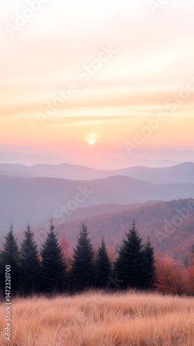 Sunrise Over Misty Mountains and Autumnal Field