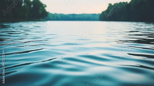 Smooth Ripples on Calm Blue Water with Soft Focus Background