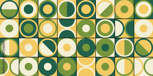 Retro-inspired geometric composition using green circles in a tiled layout. Repetitive and minimal, perfect for backgrounds, prints, or decorative design.