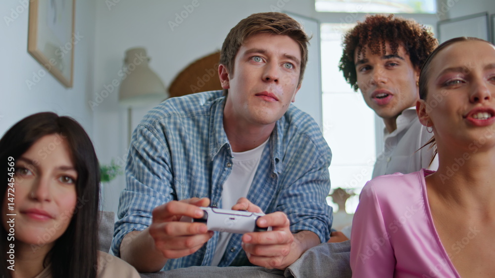 Competitive player enjoying videogame at sofa closeup. People playing console