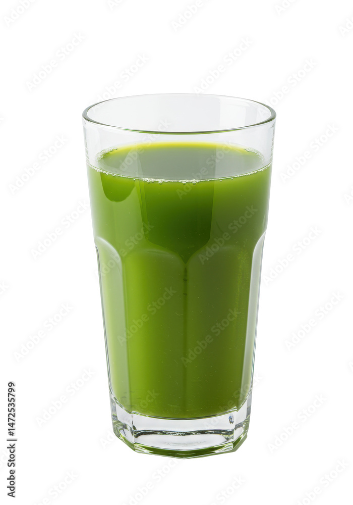 A glass filled with vibrant green juice is centered against a stark, isolated black background A glass filled with vibrant green juice is centered against a stark, isolated black background