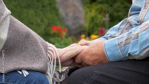 Close up hand of old woman in nurse home care holding senior men give support empathy. Elderly people in assisted living homecare mental health relief. Trustworthy talk concept with psychologist