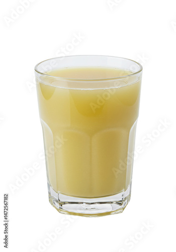 Wallpaper Mural Refreshing drink in a glass. Yellow liquid filled to the top against a dark background Torontodigital.ca