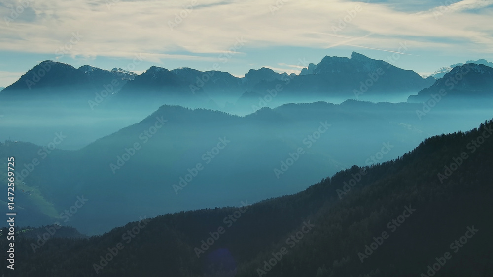 Obraz premium Aerial view of mountains under mist morning