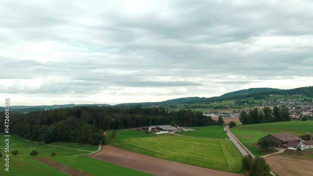 Drone View of a Modern Farm in Europe – Aerial Footage of Agricultural Buildings and Farmland Drone View of a Modern Farm in Europe – Aerial Footage of Agricultural Buildings and Farmland