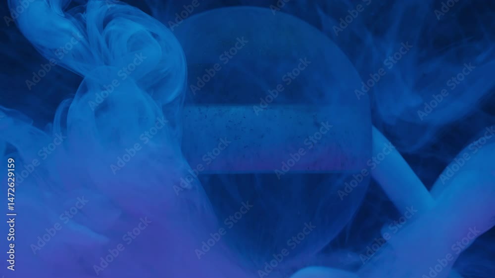 Smoke drop. Ink splash. Defocused blue neon color ball dust liquid paint texture chemical fluid floating on abstract dark black background.