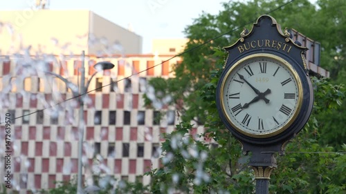 old clock in front of a building