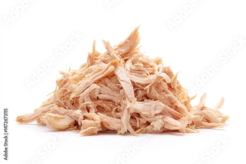 Shredded chicken on a white background.