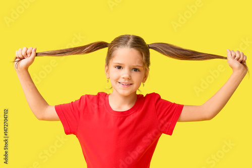Happy little girl with pigt...