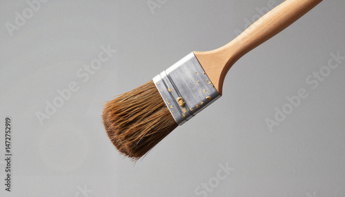 Paintbrush on gray background