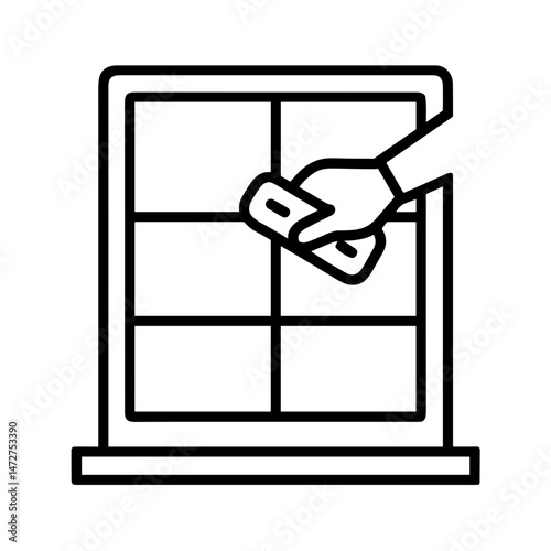 Hand cleaning a window with a microfiber cloth  