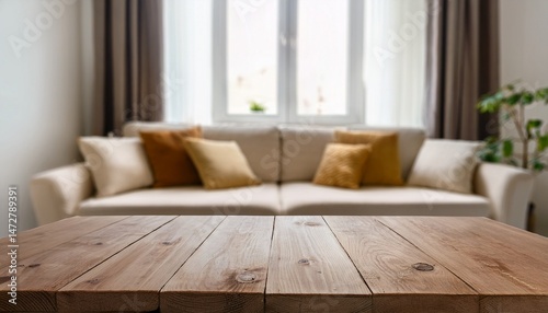 blurred view of light living room with sofa and soft bench unfocused background photo selective focus