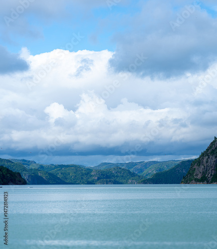 Wallpaper Mural Serene lake surrounded by lush mountains. Torontodigital.ca