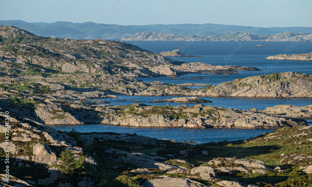 Scenic coastal islands with blue water.