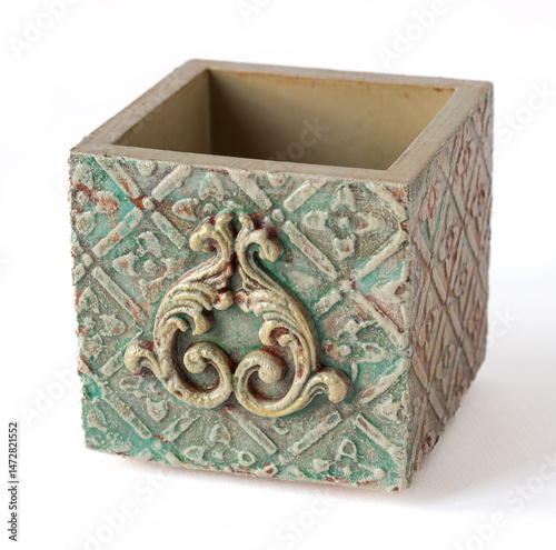Candlestick cube in mix media style with white tea candle. Handiwork. Handmade square pot pot and cactus.