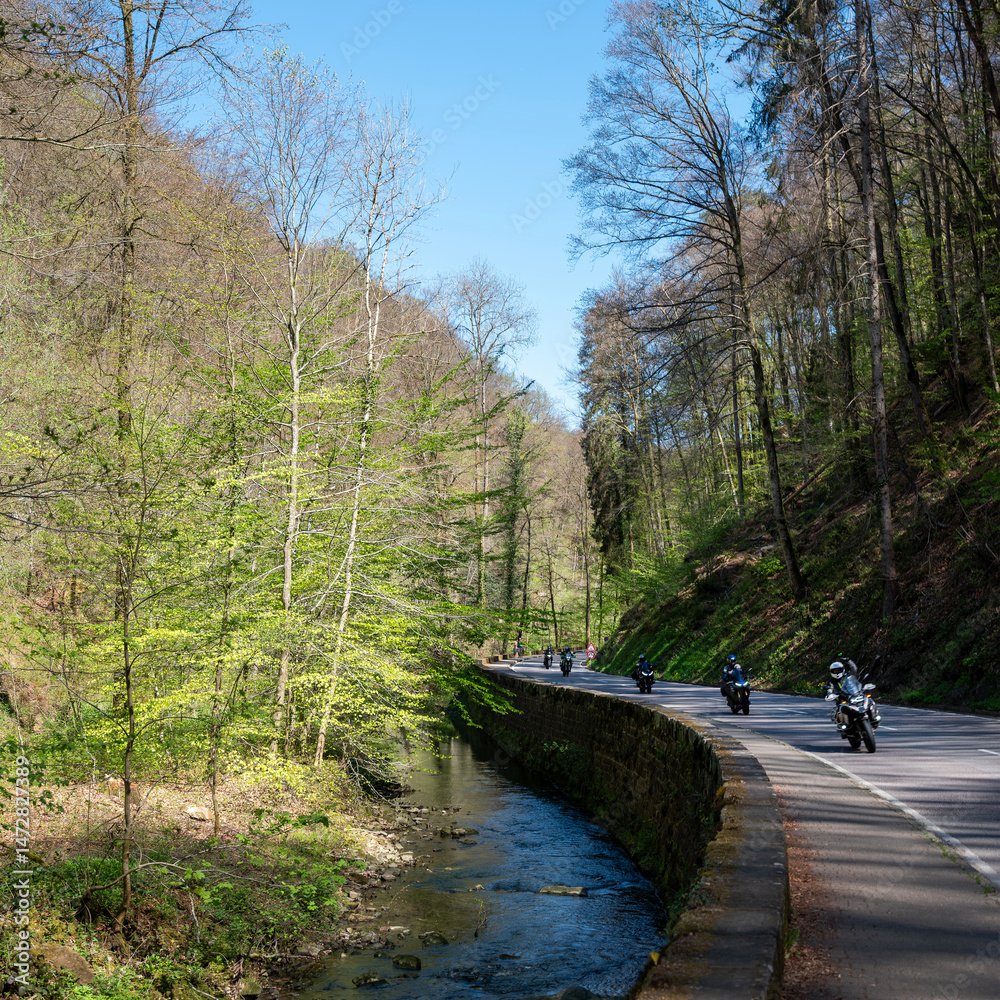 motorcycles on the road through the muellertal on sunny day in spring