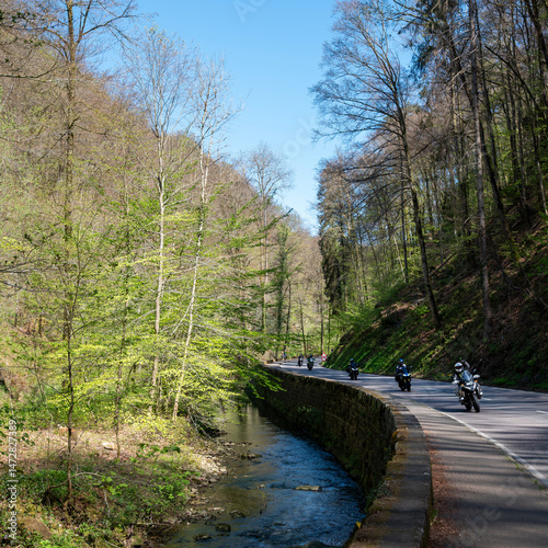 Obraz na płótnie motorcycles on the road through the muellertal on sunny day in spring w salonie