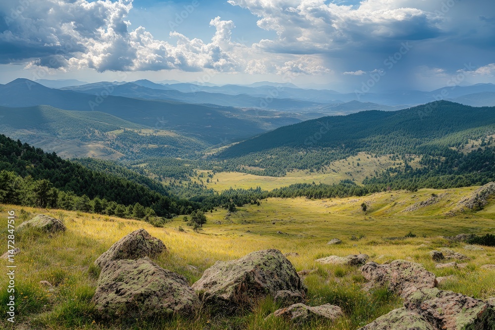 Naklejka premium Mountain valley vista, lush greenery, rolling hills