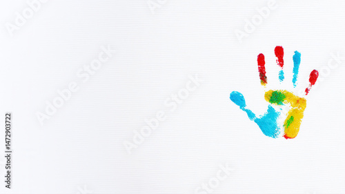 Colorful handprint artwork on a blank canvas  
