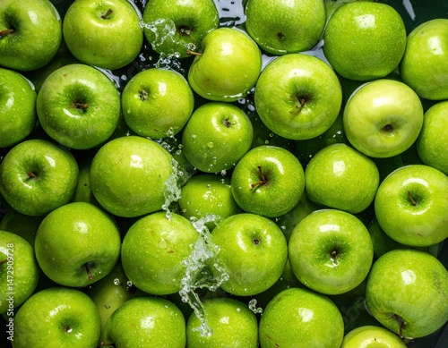 High Resolution Close-up of fresh organic bright green apples being dropped in fresh transparent water, generate 50 keywords for stock photage selling