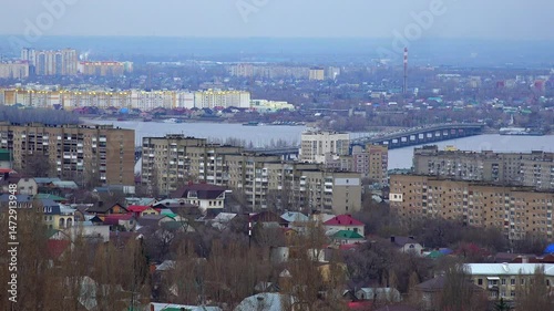 Panoramic cityscape with river and bridge