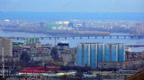 Panoramic cityscape with river and bridge