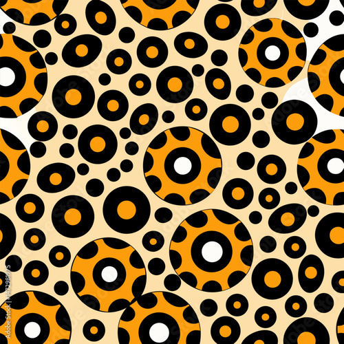 Artistic Pattern of Circles: A vibrant collection of concentric circles in contrasting colors of black, orange, and cream creates a stunning repeating pattern.