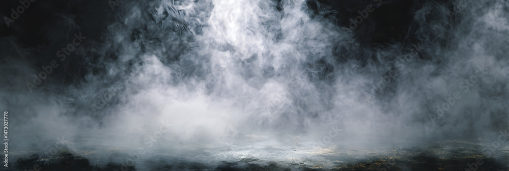 Fototapeta premium Fog covers a mountainous terrain during the early morning hours creating a mysterious atmosphere for hikers and nature enthusiasts