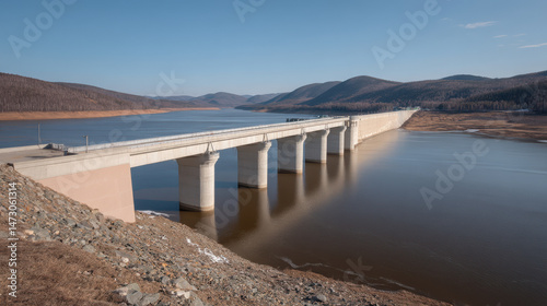 hydroelectric dam in russia casting long shadows showcasing dramatic contrasts photo