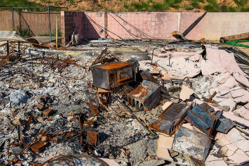burned debris at home destroyed in the Altadena wildfires on Loma Alta Drive in Altadena California USA