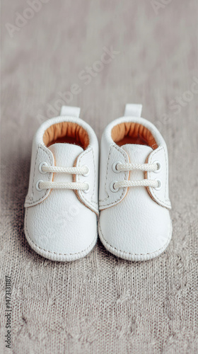 Cute baby shoes in white leather