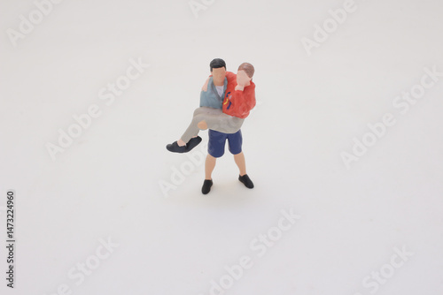 Miniature Figures Depicting Fun and Playful Interaction