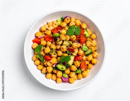 Chickpea salad with diced tomatoes, cucumber, red onion, cilantro in white bowl