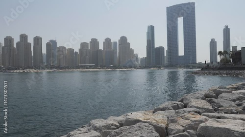 Dubai, United Arab Emirates - February 15 2023: Iconic Dubai cityscape on the shoreline.
