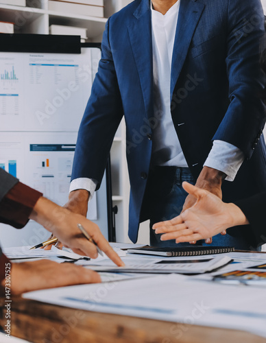 Accounting company provide finance and taxation planning for profitable cash flow, Auditor and accountant team working in office, analyze financial data and accounting record with calculator.Insight