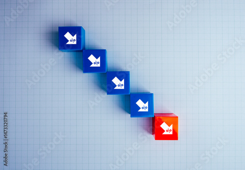 Crisis down chart. Economic downturn with decrease arrow with percentage icons on blue and red cube block steps on graph paper background. Interest rates, stock trading, Business financial concept.