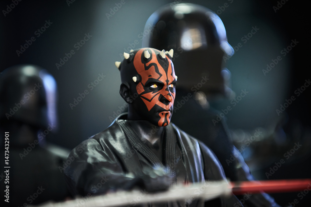 Naklejka premium A close-up photo of a Darth Maul figure with bokeh background, celebrating Star Wars Day in San Salvador on May 4, 2025.