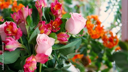 Beautiful bouquet of red roses and alstermeria. High quality FullHD footage