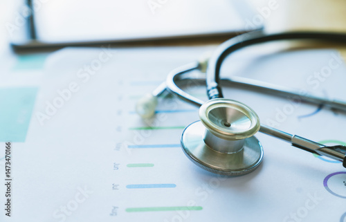 Stethoscope on desk and and patient information.