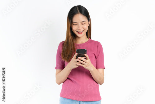 Smiling asian woman hand holding smartphone on white background.