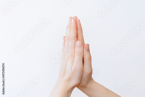 Foto Hands in Prayer on White Background