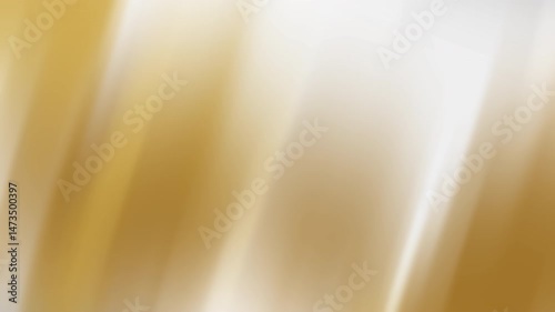 A soft golden gradient with subtle light and shadow creates a smooth and elegant abstract background.