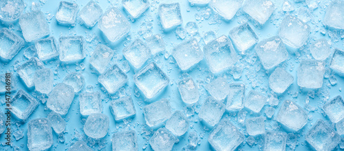 Cooling background banner with ice cubes on blue textured surface, refreshing summer drink concept, frozen water, chilled beverage, icy freshness, frozen cubes