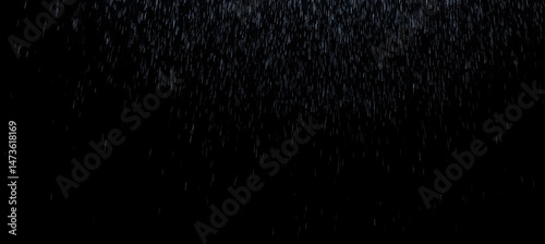 Rain overlay on black background, falling raindrops, blurred water droplets, rainy scene, cinematic rainfall texture, wet weather effect, stormy atmosphere